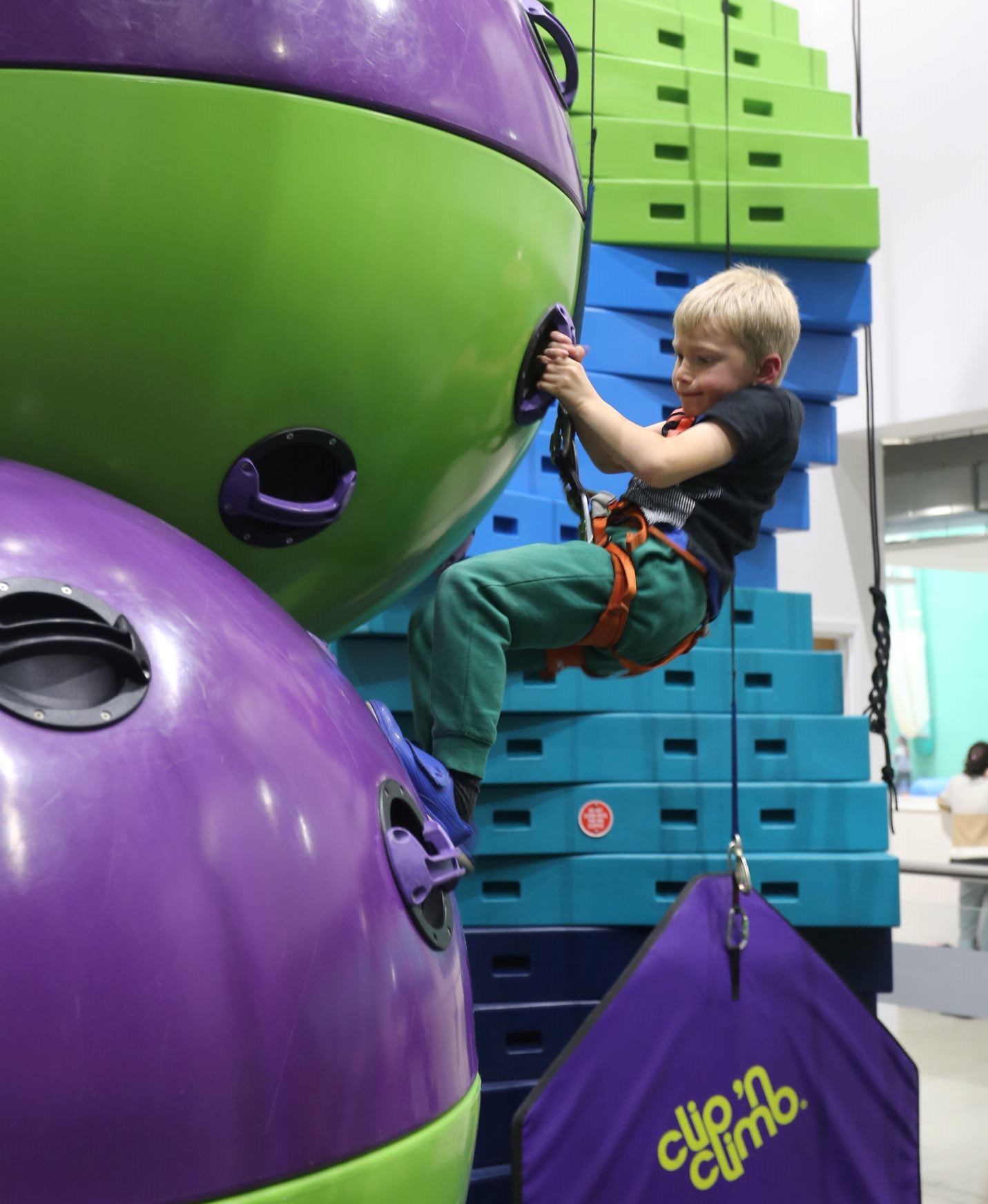 Boy on Clip 'n Climb at The Bridge