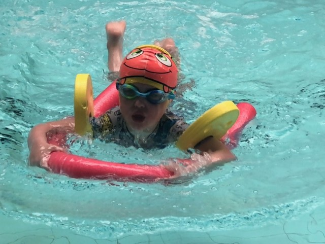 Child swimming at Warminster Sports Centre